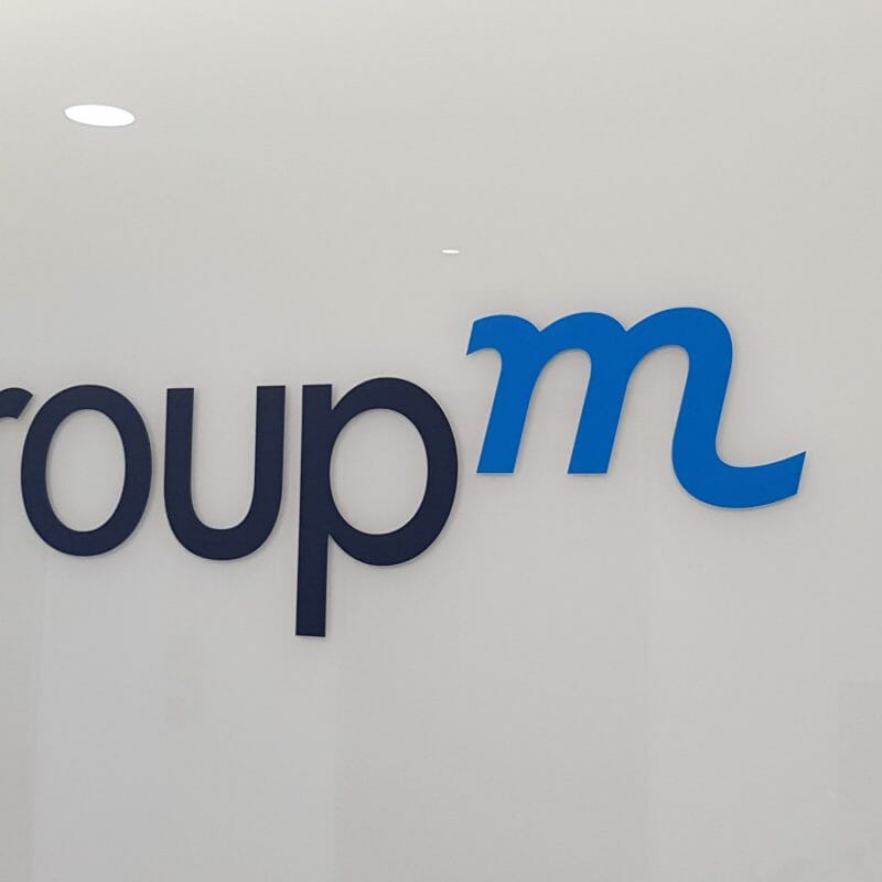 Group M signage on the exterior of their London office building.
