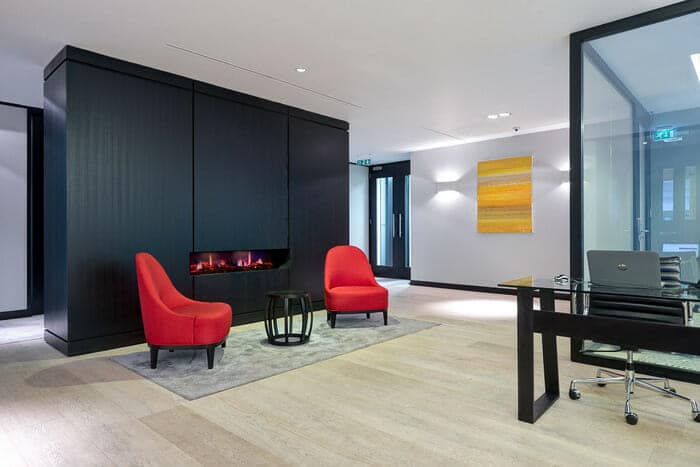 The restored marble reception lobby at One Avenue Group, Petty France, showcasing a mirror finish following professional diamond grinding and polishing by Prestige.