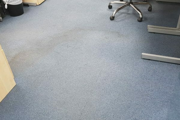 Water stained office carpet tiles