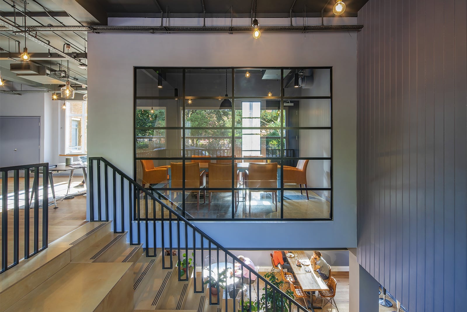 The contemporary office interior of Canva in Hoxton Square, London, maintained by Prestige.