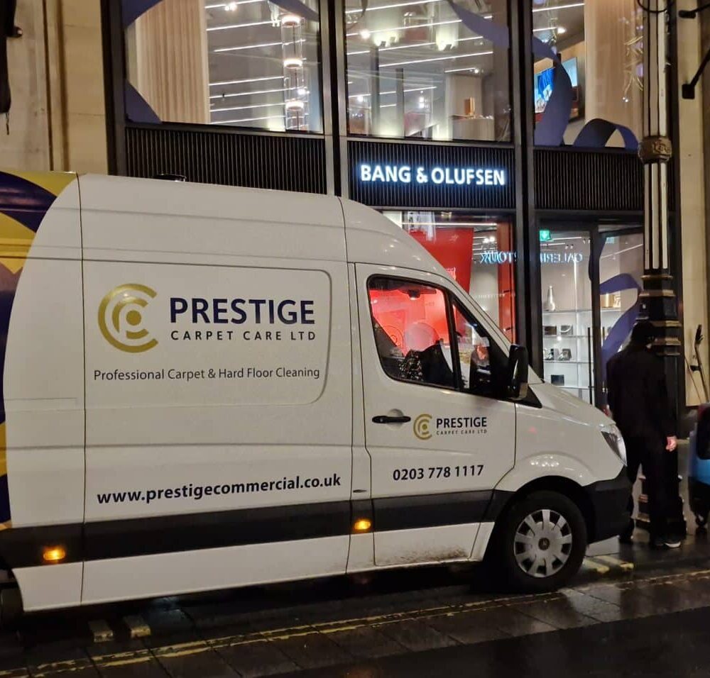 Prestige Commercial liveried service van parked on New Bond Street for out-of-hours luxury retail carpet cleaning.