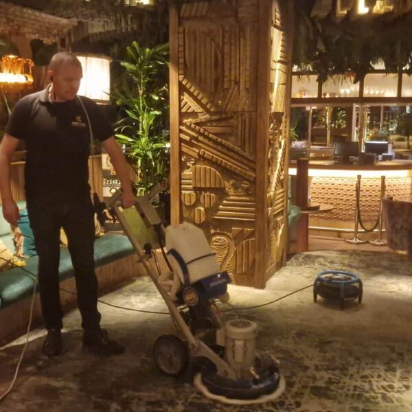 Professional HOS Orbot carpet cleaning London at Amazónico Mayfair, using a clean bonnet to ensure rapid drying and a flawless finish.