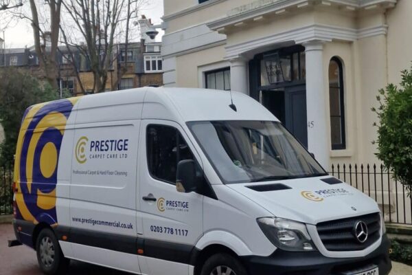 Prestige Commercial Carpet Cleaning van parked outside the Australian High Commission in London for high-end rug cleaning and fitted carpet wet extraction.