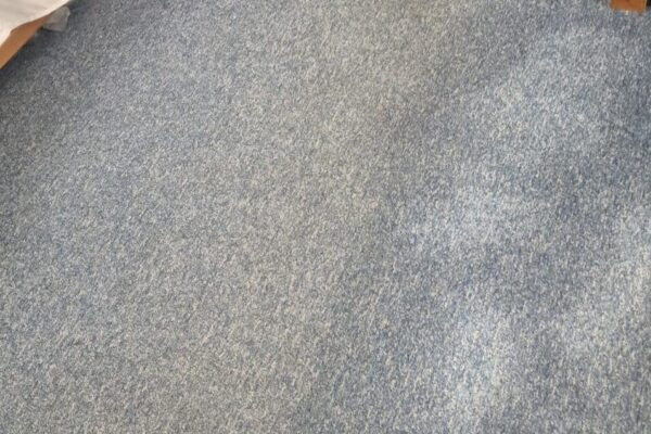 Orbital carpet cleaning machine removing heavy soiling from basement carpet tiles at Browns Bride, 12 Hinde Street, Marylebone, London.